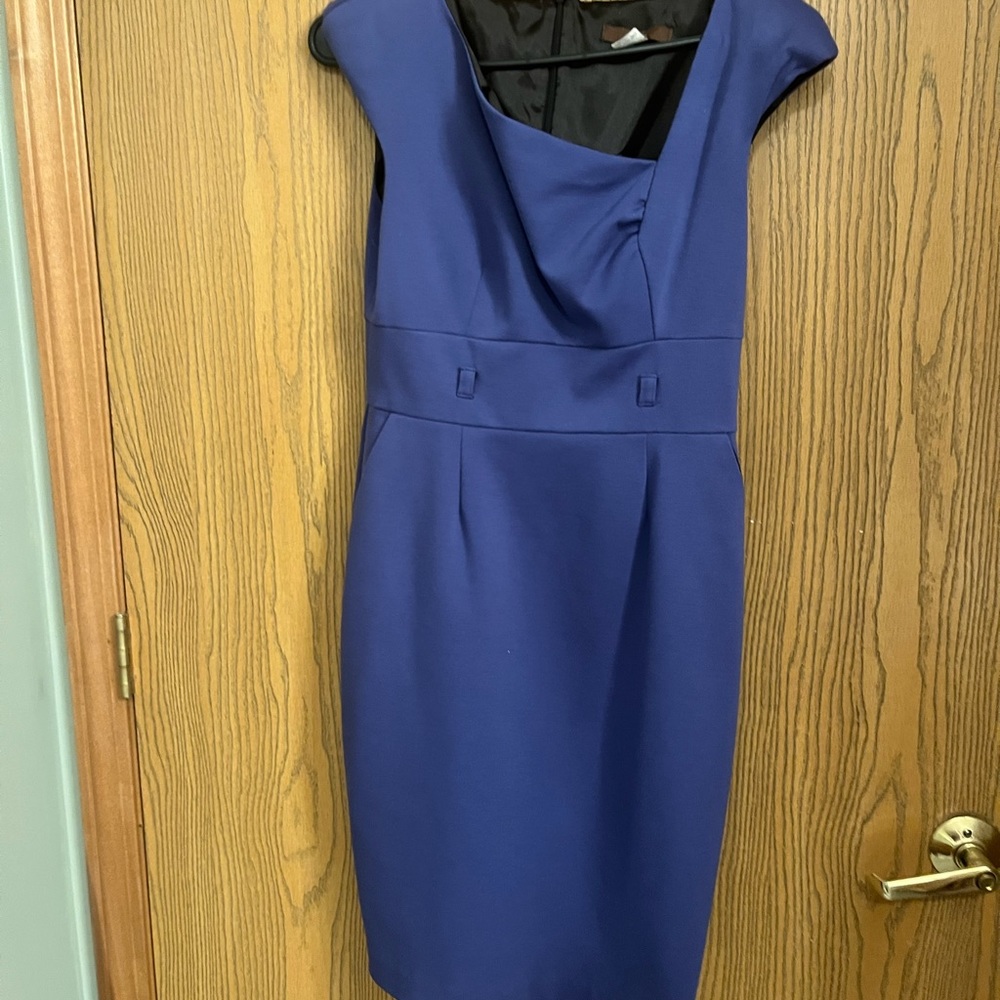 Purple career dress worn slanted chest detail